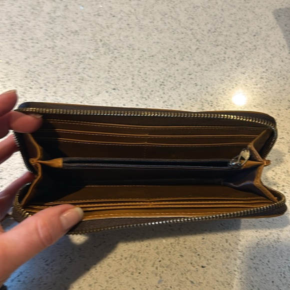 Brown and tan zipper wrist wallet. - Picture 3 of 7